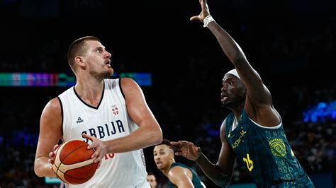 Jokic and Serbia come back to beat Australia in Olympic  .